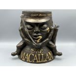 The Macallan sleeping barrel ice bucket, figural golf themed advertising piece, item is embossed