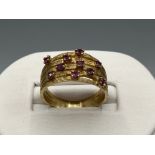 Ladies 9ct gold Ruby 10 stone fancy ring, size Q (4.58g)