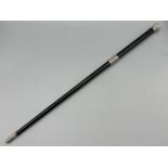 An Ebony and white metal mounted conductors baton - 49cm long