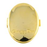 A double-sided compact mirror, by Christian Dior.