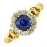 A sapphire and old-cut diamond cluster ring.