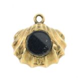 A 19th century gold engraved shell charm/pendant, with glazed panel reverse.