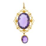 A Victorian gold filigree amethyst drop pendant.