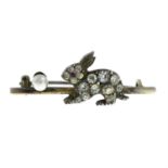 A late 19th century silver seed pearl and paste rabbit brooch, with pink-gem eye detail.