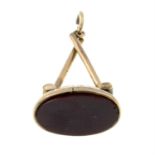 A late 19th century gold carnelian fob.