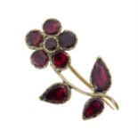 A late Georgian 9ct gold garnet floral brooch.