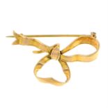 An early 20th century 15ct gold bow brooch.