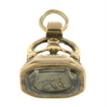 A late 19th century gold foil-back rock quartz monogram seal fob.