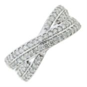 A circular-cut diamond dress ring.