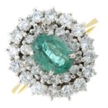 An 18ct gold emerald and diamond cluster ring.