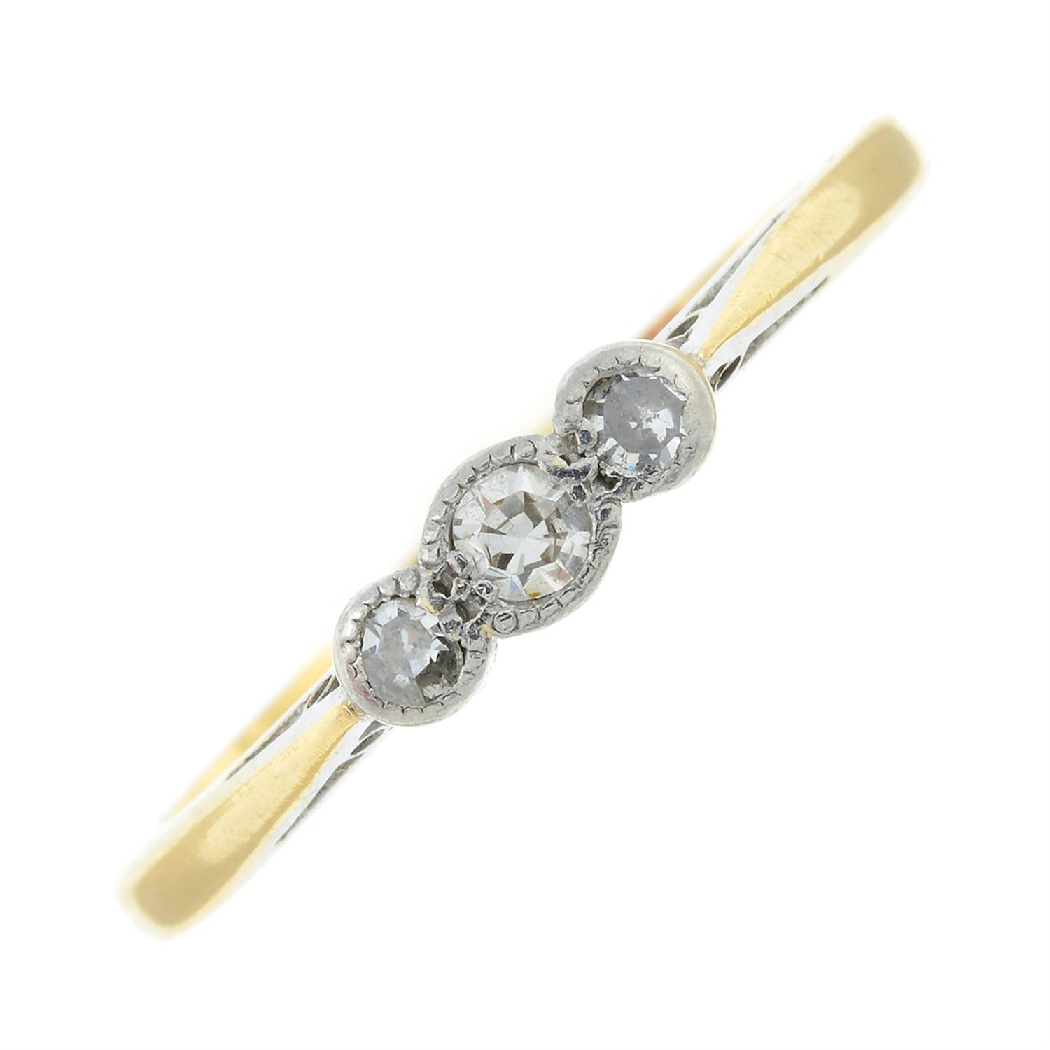 An early 20th century single-cut diamond three-stone ring.