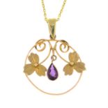 An early 20th century 9ct gold amethyst three-leaf clover pendant, with later chain.