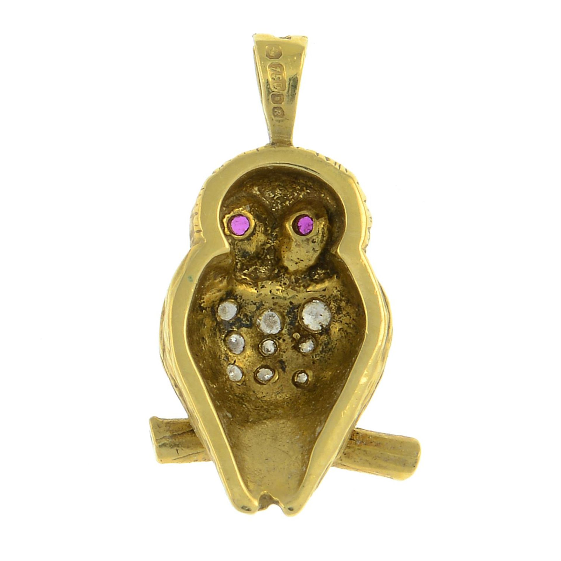 An 18ct gold pave-set diamond and ruby owl pendant. - Image 2 of 2