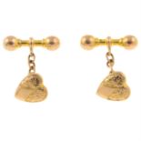 A pair of Edwardian 9ct gold engraved heart cufflinks.