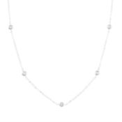 An 18ct gold trace-link necklace, with diamond spacers.