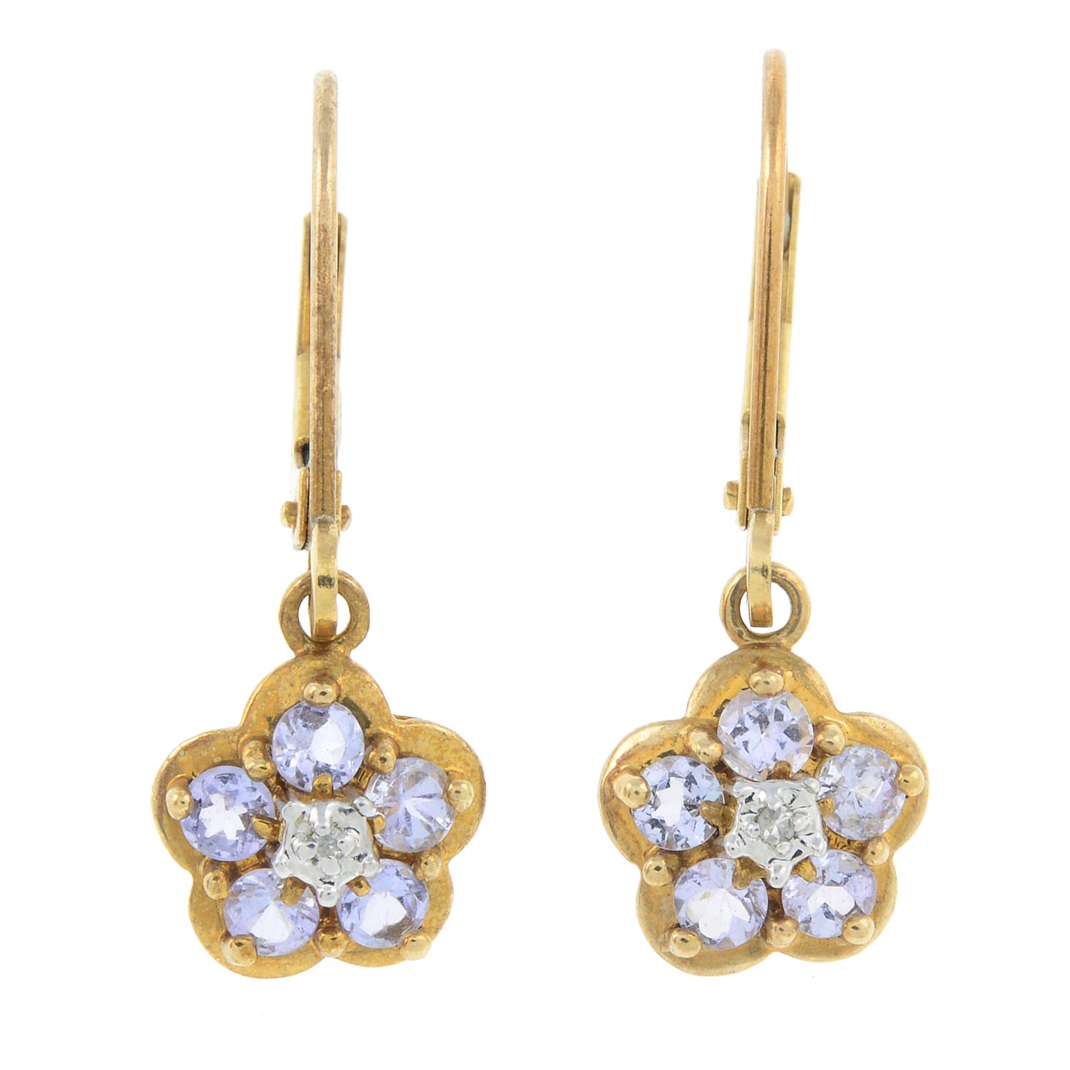 A pair of iolite and diamond floral drop earrings.