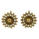 A pair of split pearl earrings.