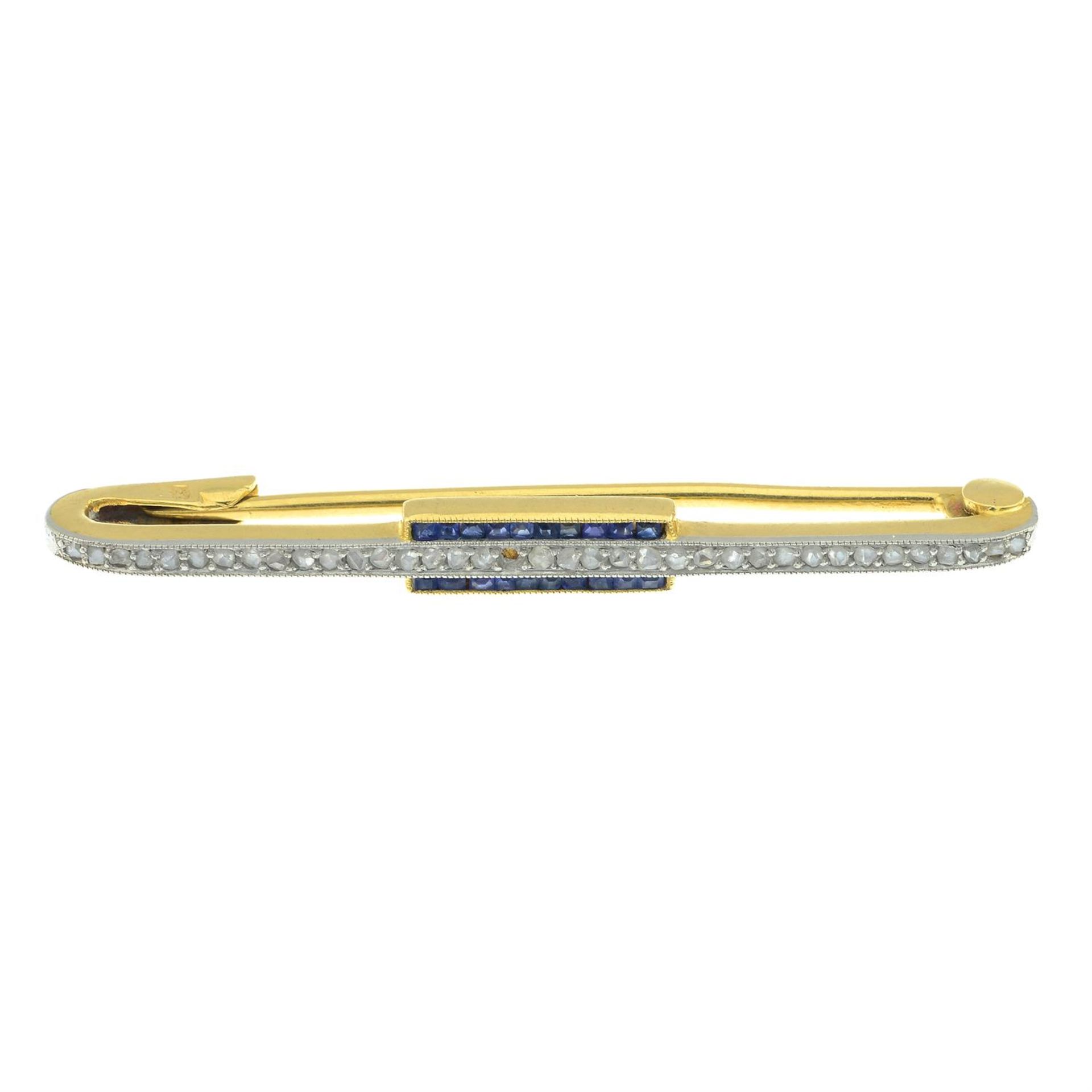 An early 20th century gold and platinum rose-cut diamond and sapphire bar brooch.