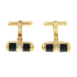 A pair of 9ct gold onyx and mother-of-pearl cufflinks.