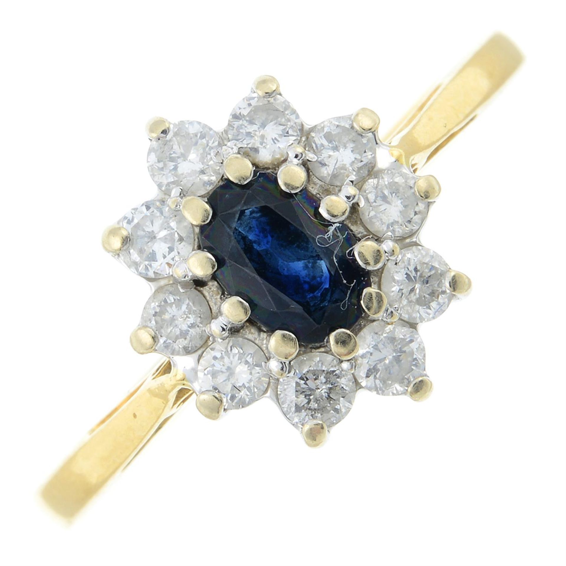 An 18ct gold sapphire and diamond cluster ring.