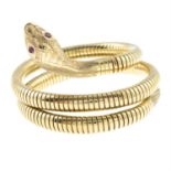 A 9ct gold snake bangle, with ruby eye accents.