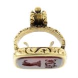 A late Victorian carnelian intaglio seal fob, carved to depict a mythical creature's head.