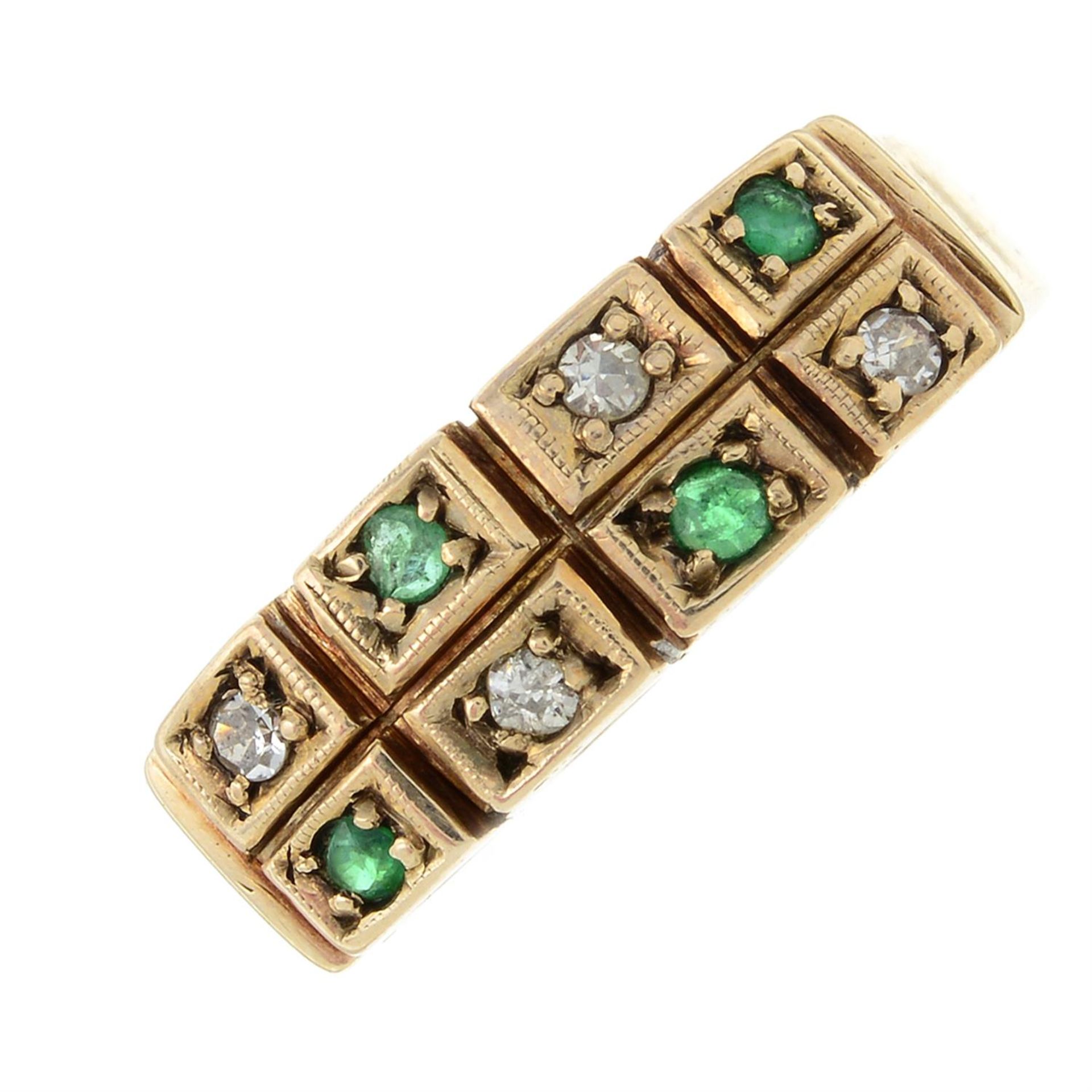 A 1970s 9ct gold diamond and emerald dress ring.