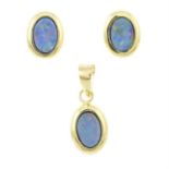 A pair of opal doublet earrings and a matching pendant.