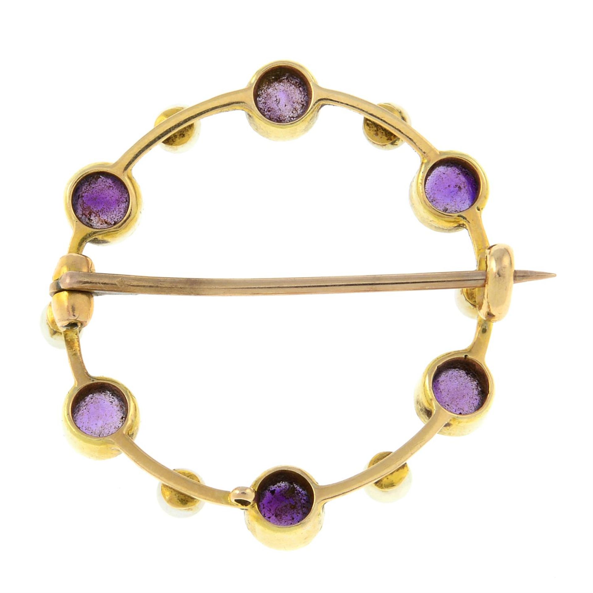 An early 20th century 9ct gold amethyst and seed pearl wreath brooch. - Image 2 of 2