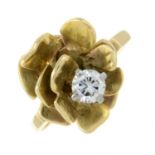 A brilliant-cut diamond accent floral dress ring.