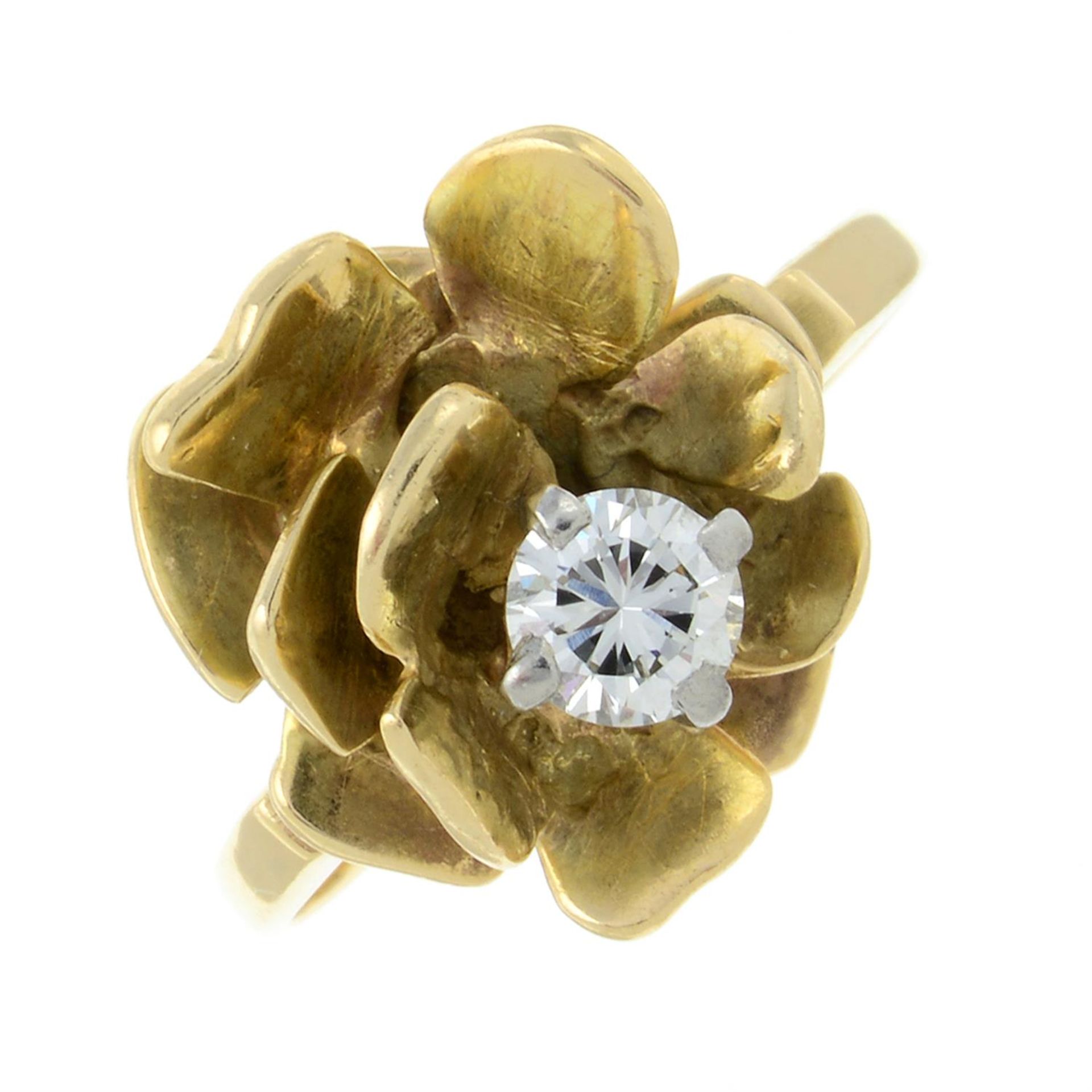 A brilliant-cut diamond accent floral dress ring.