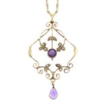 An early 20th century 9ct gold amethyst and seed pearl pendant, with base metal chain.