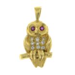 An 18ct gold pave-set diamond and ruby owl pendant.