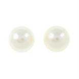 A pair of cultured pearl stud earrings.