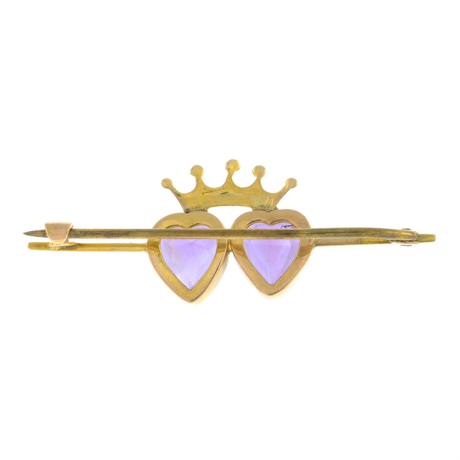An early 20th century amethyst and seed pearl double heart and crown brooch. - Image 2 of 3