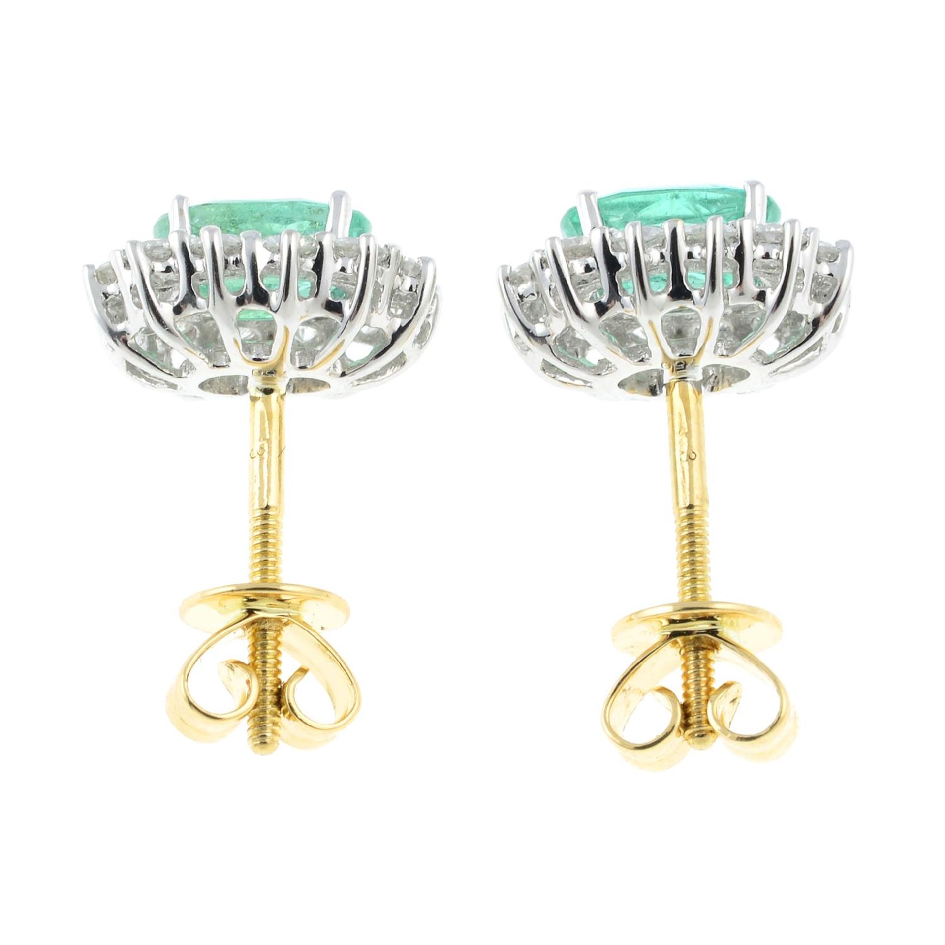 A pair of 18ct gold emerald and diamond cluster earrings. - Image 2 of 2
