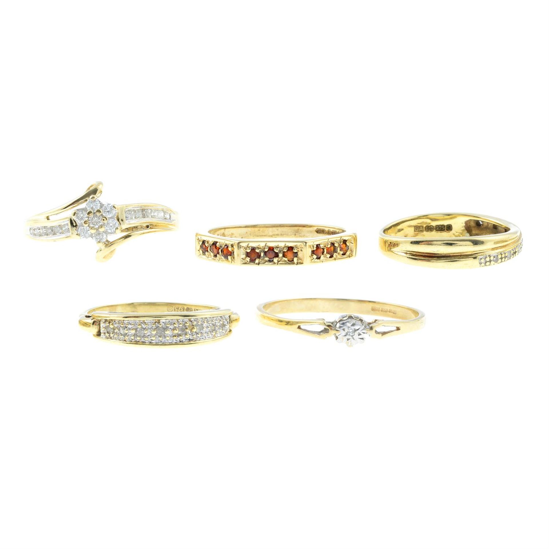 Five 9ct gold gem-set rings.