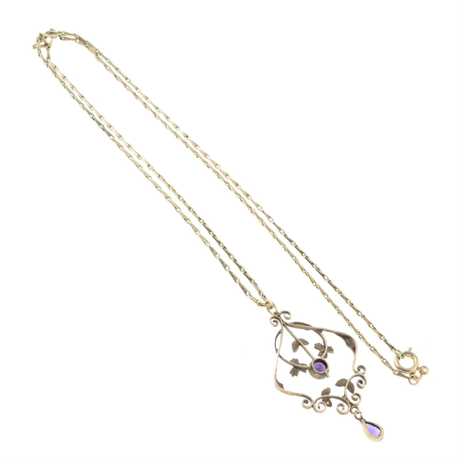 An early 20th century 9ct gold amethyst and seed pearl pendant, with base metal chain. - Image 2 of 2
