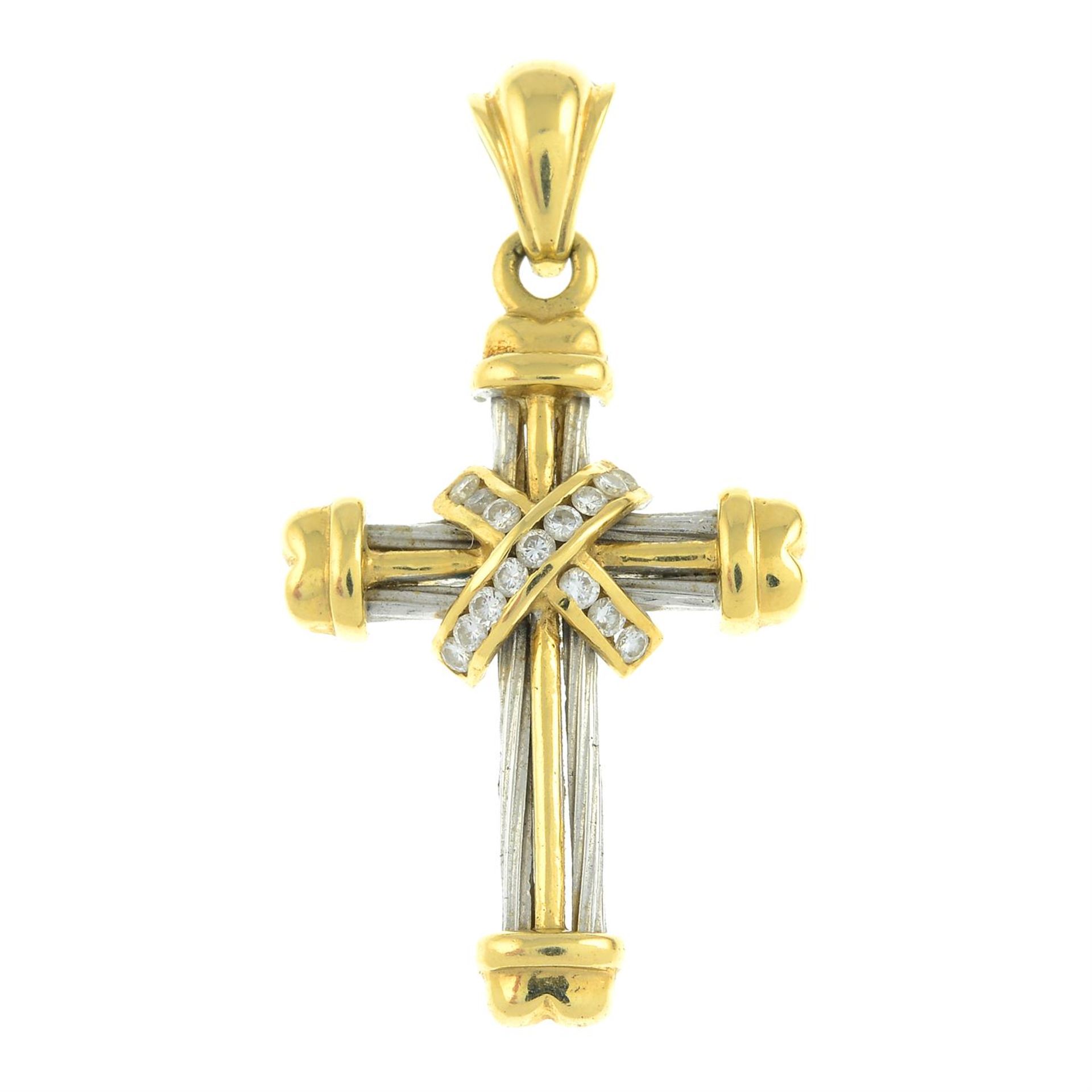 An 18ct gold diamond bi-colour cross pendant.