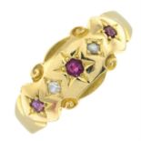 An Edwardian 18ct gold ruby and diamond ring.