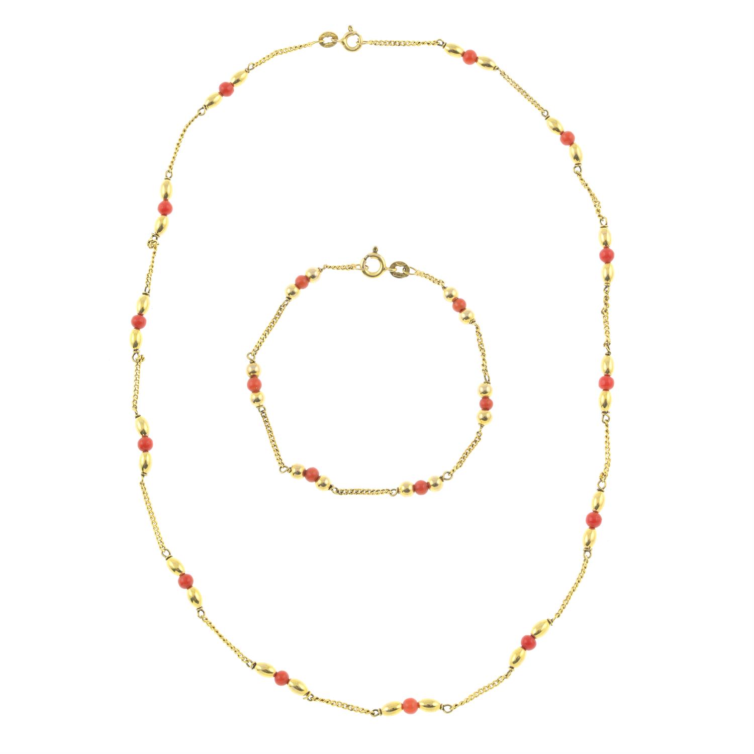 A coral bead necklace, with matching bracelet.