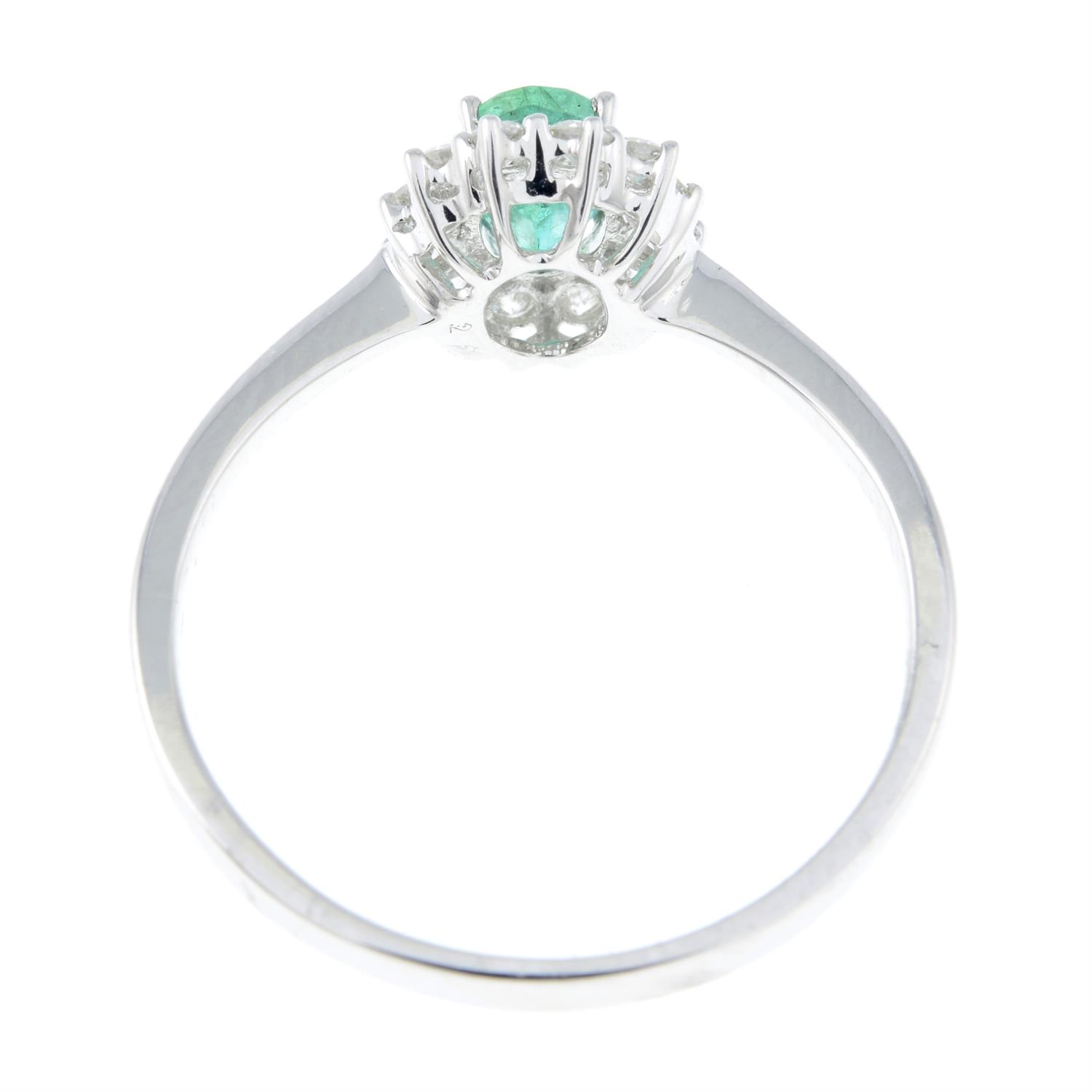 An 18ct gold emerald and diamond cluster ring. - Image 2 of 2