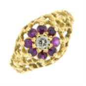 A 1970s diamond and ruby textured cluster ring.