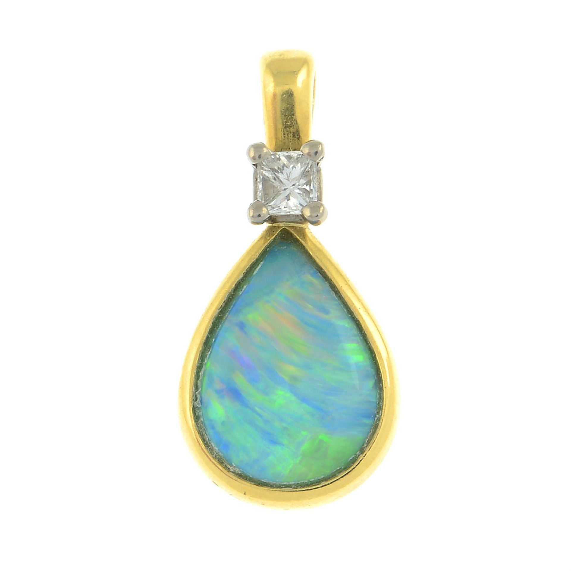 An 18ct gold opal and diamond pendant.