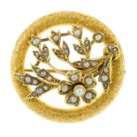An early 20th century 15ct gold split pearl brooch, with floral motif.