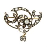 An early 20th century seed pearl and rose-cut diamond floral brooch.