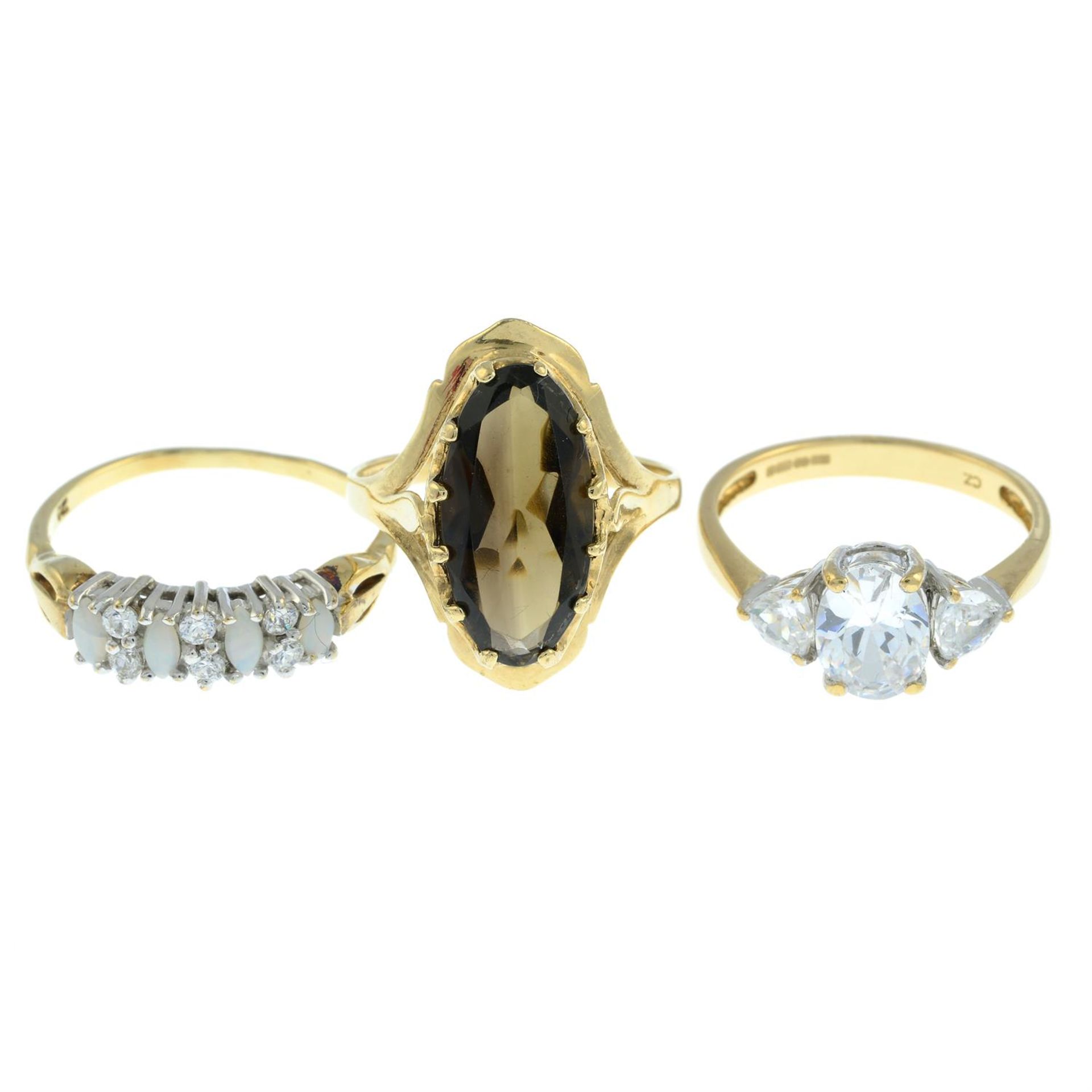 Three 9ct gold gem-set rings.