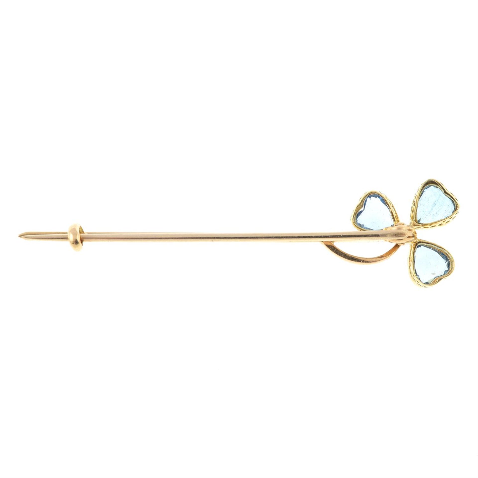 An early 20th century gold and platinum aquamarine and seed pearl shamrock bar brooch. - Image 2 of 2