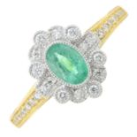 An 18ct gold emerald and diamond cluster ring.