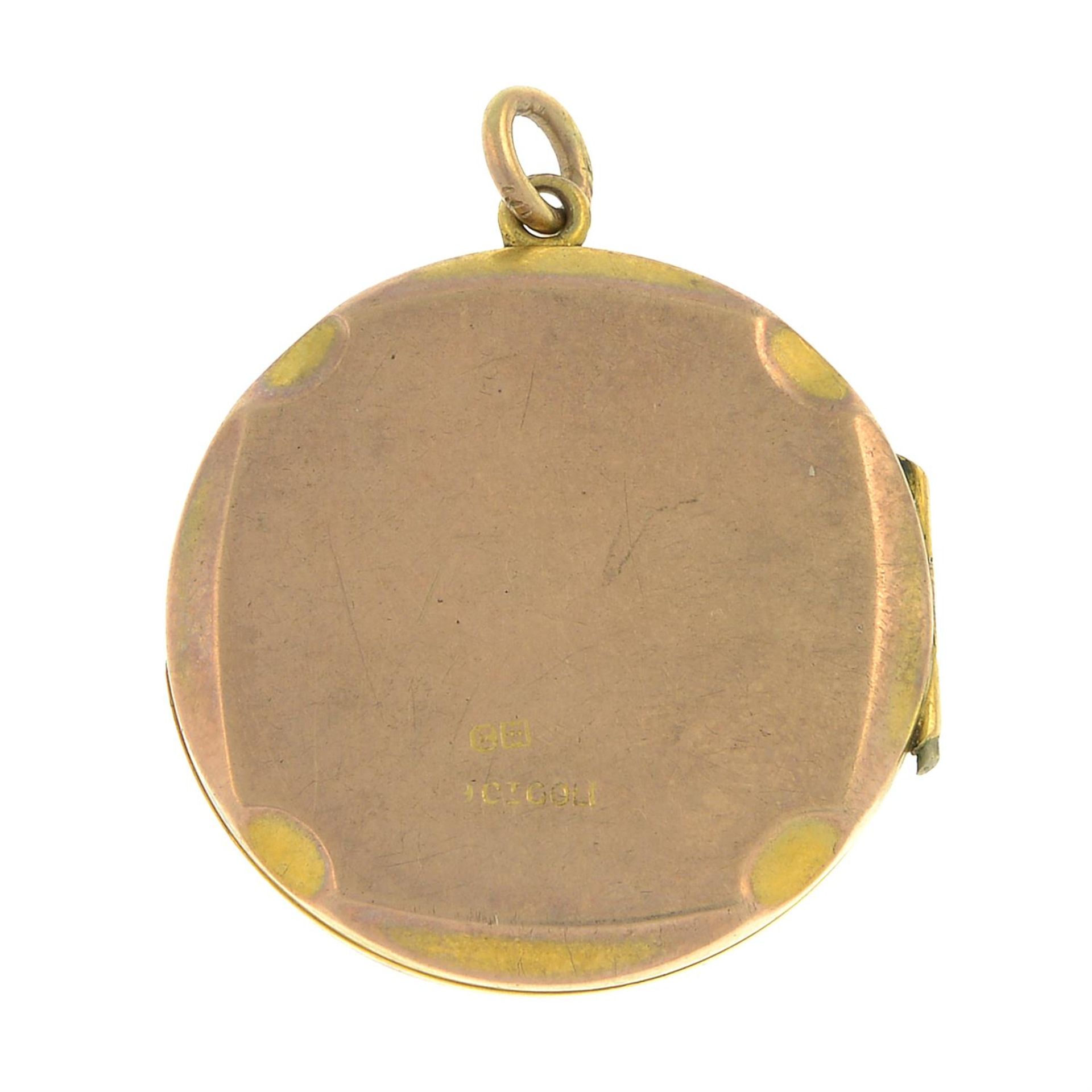 An early 20th century 9ct gold engine-turned locket. - Image 2 of 2